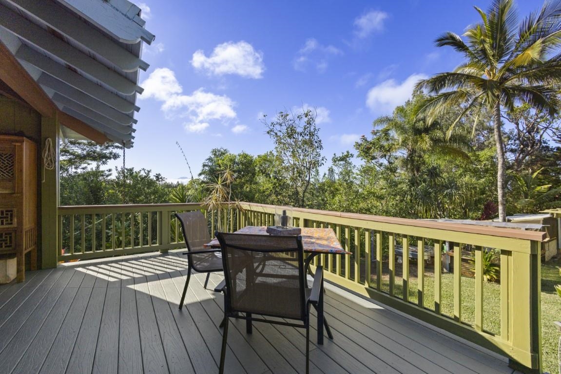 690 East Kuiaha Road Haiku, HI 96708 - Photo 28 of 30 a view of balcony with furniture and wooden deck