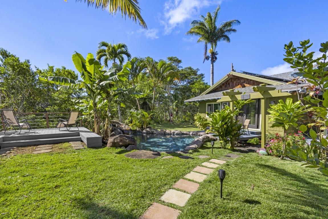 690 East Kuiaha Road Haiku, HI 96708 - Photo 4 of 30 a view of a house with a yard and sitting area