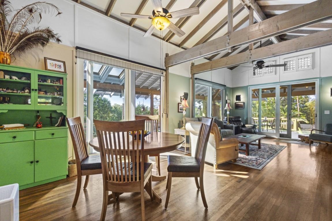 690 East Kuiaha Road Haiku, HI 96708 - Photo 10 of 30 a view of a patio with a table chairs and a backyard