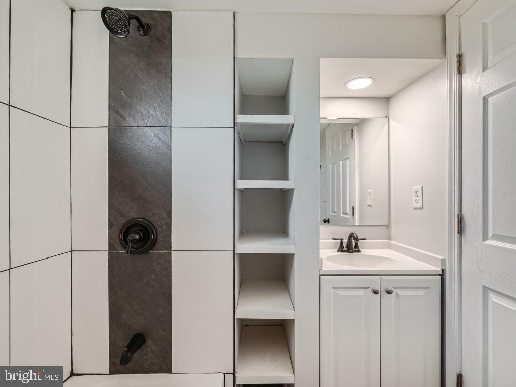 3314 Hillsmere Road Gwynn Oak, MD 21207 - Photo 8 of 29 Lower Level Full Bath w/ Built-Ins