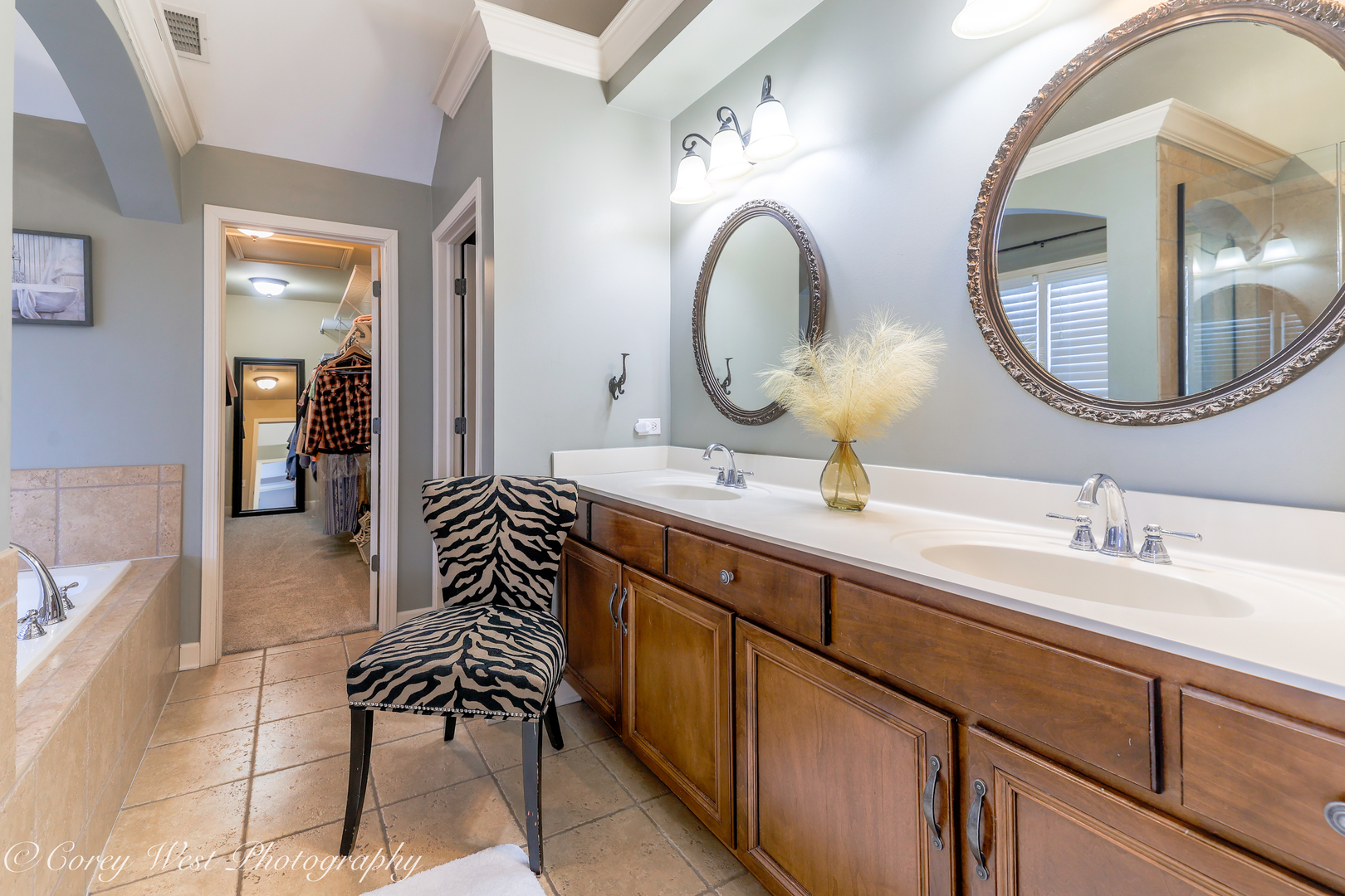 801 Citizen Avenue Elburn, IL 60119 - Photo 24 of 49 a bathroom with a double vanity sink and a mirror