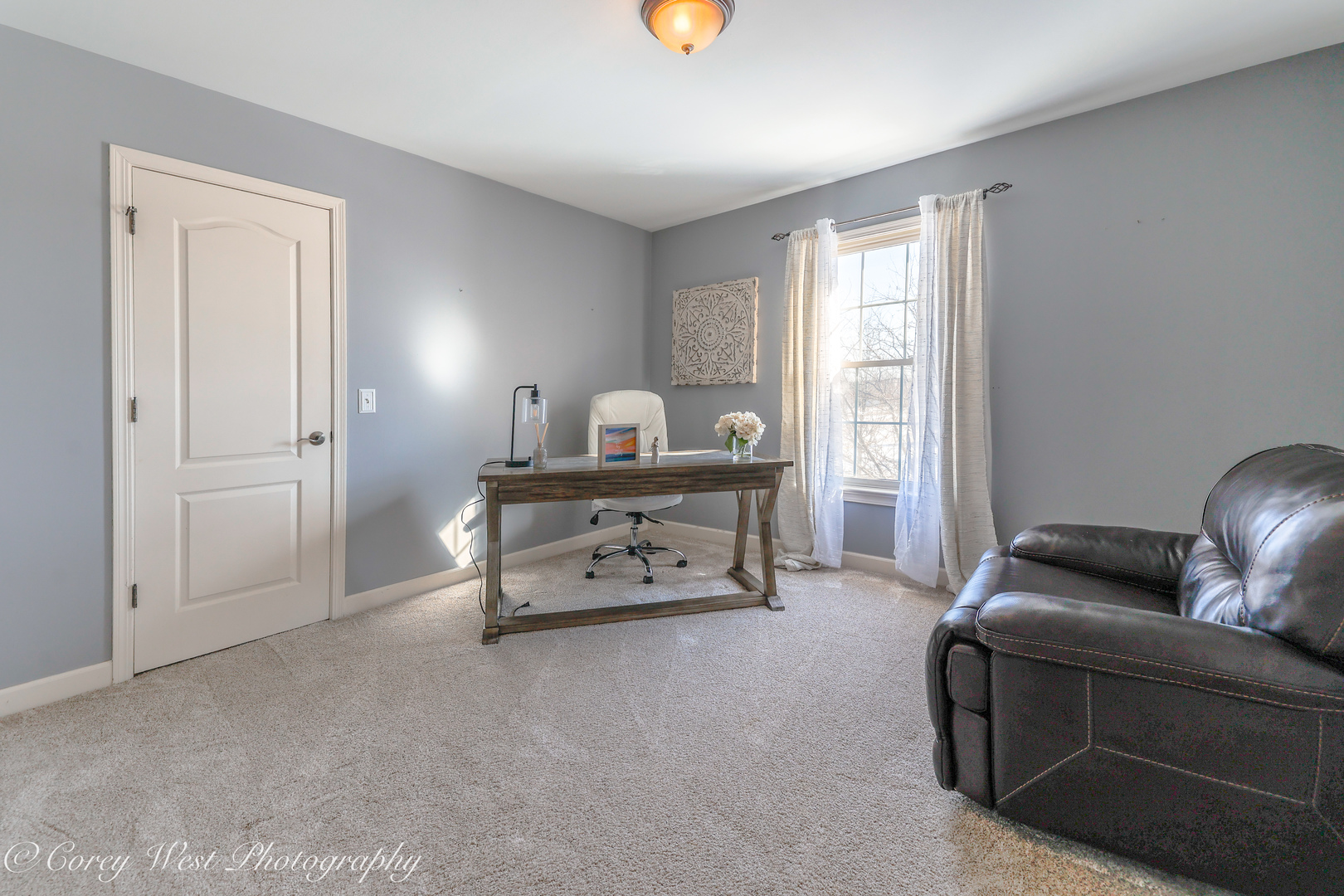 801 Citizen Avenue Elburn, IL 60119 - Photo 28 of 49 a living room with furniture and a window