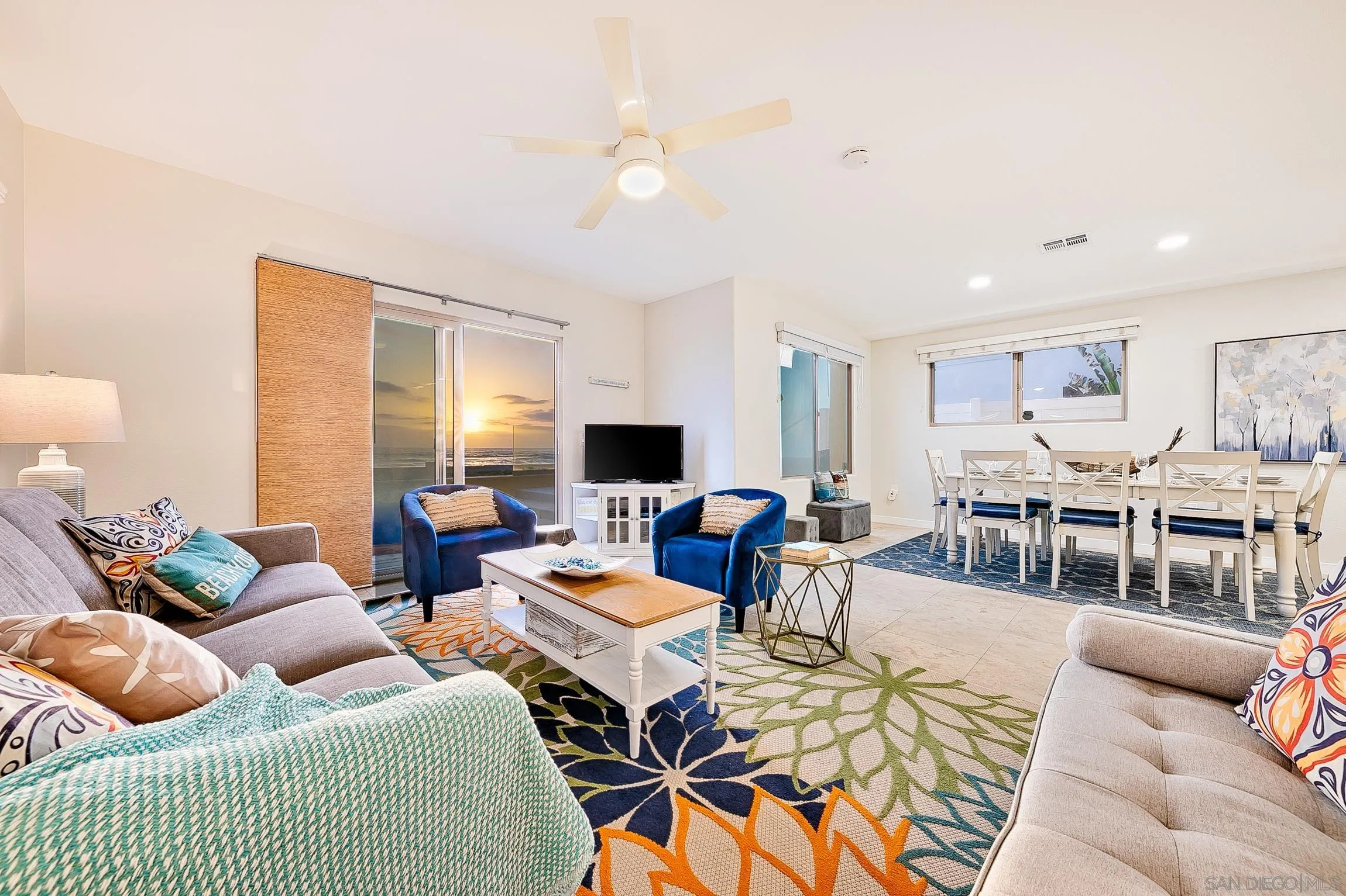 3537 Ocean Front Walk San Diego, CA 92109 - Photo 14 of 51 a living room with furniture and a flat screen tv