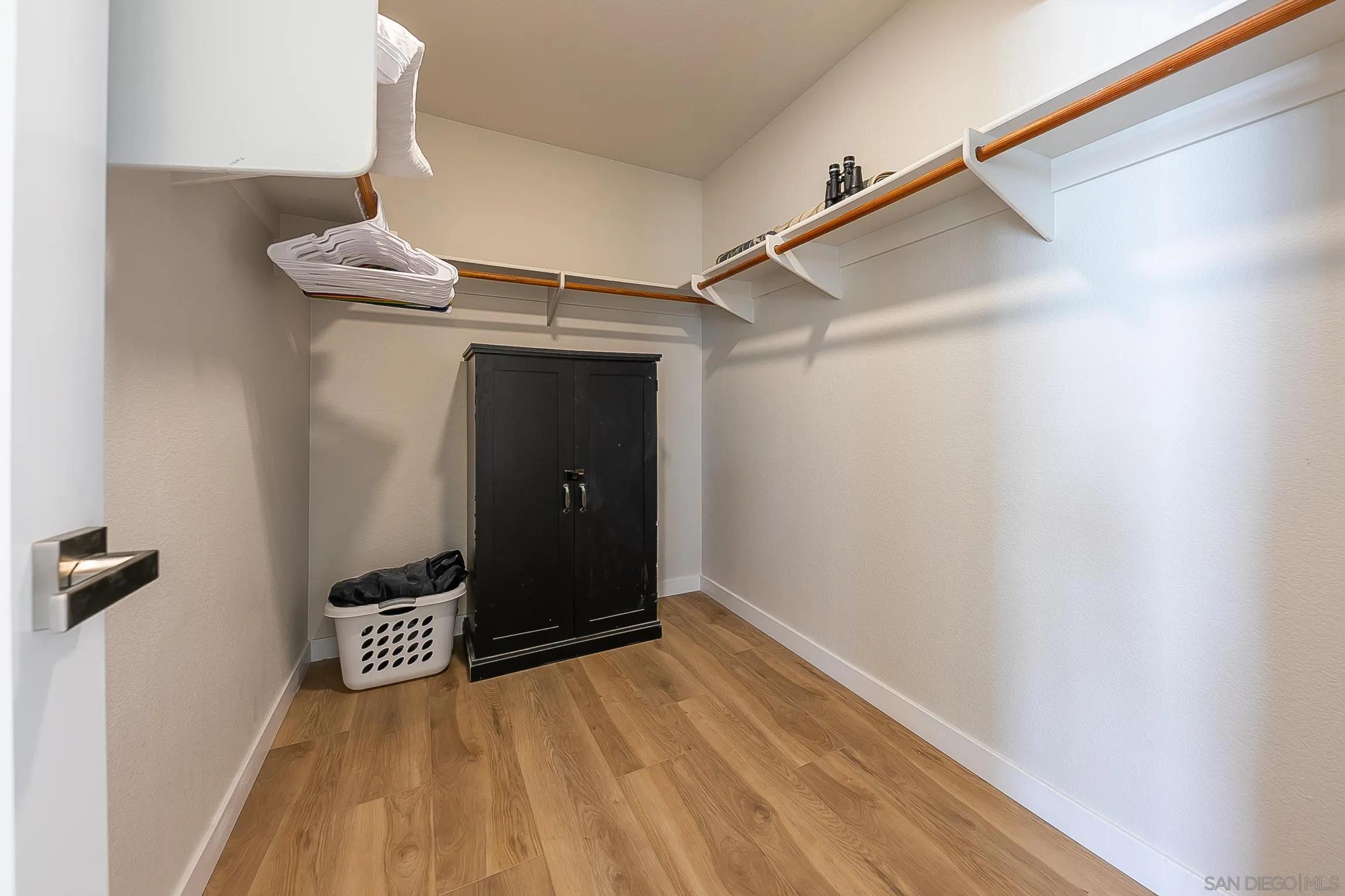 3537 Ocean Front Walk San Diego, CA 92109 - Photo 31 of 51 a view of a room with wooden floor