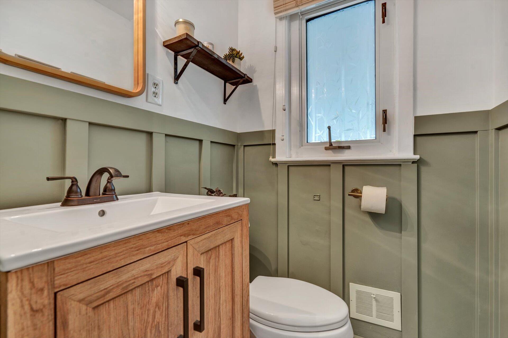 3038 Burnleigh Road Southwest Roanoke, VA 24014 - Photo 19 of 34 a bathroom with a sink a toilet and shower