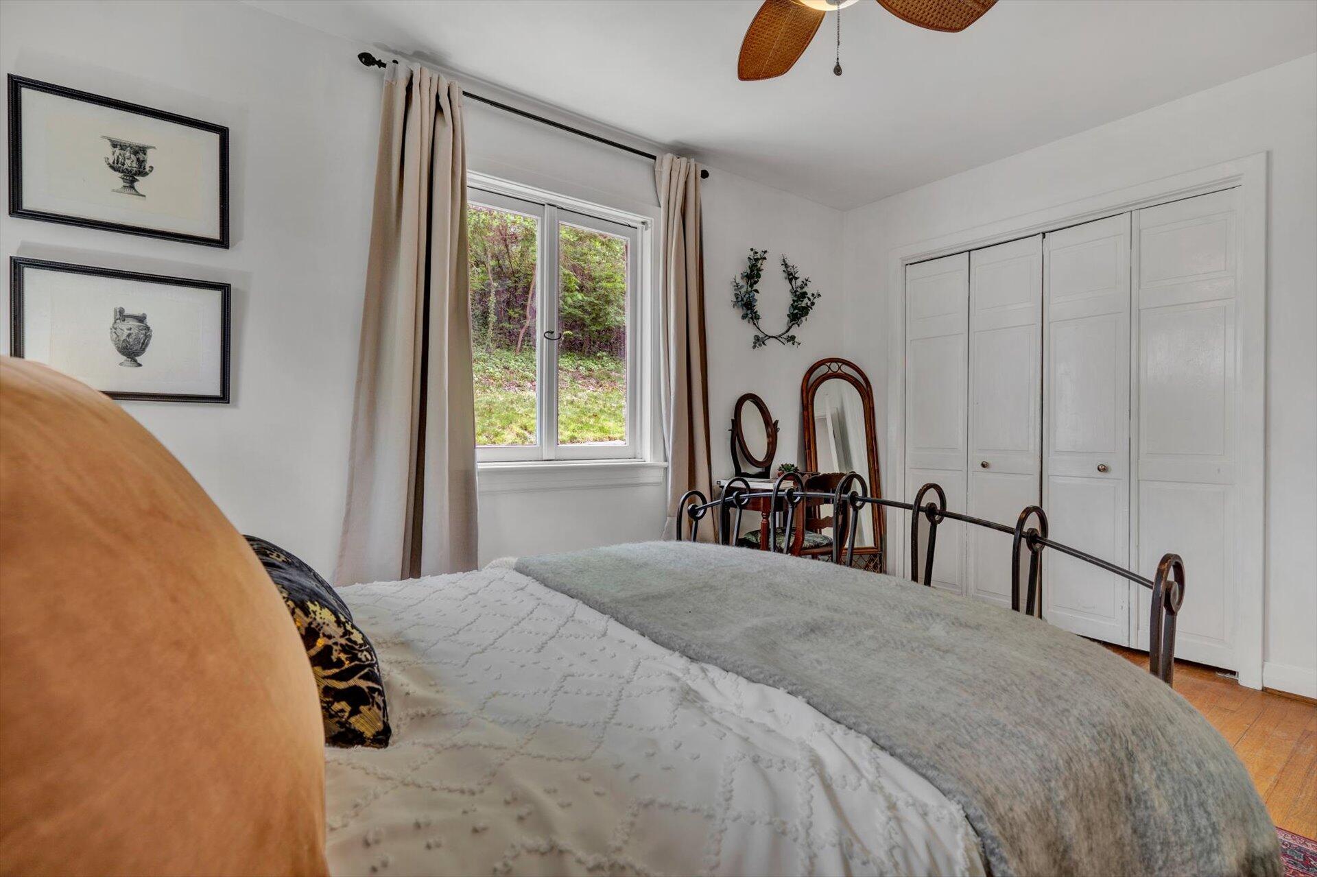 3038 Burnleigh Road Southwest Roanoke, VA 24014 - Photo 21 of 34 a bedroom with a bed and a large window