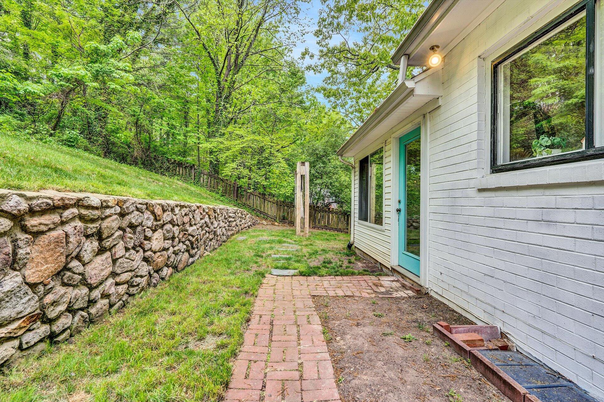3038 Burnleigh Road Southwest Roanoke, VA 24014 - Photo 30 of 34 a view of a backyard with pathway