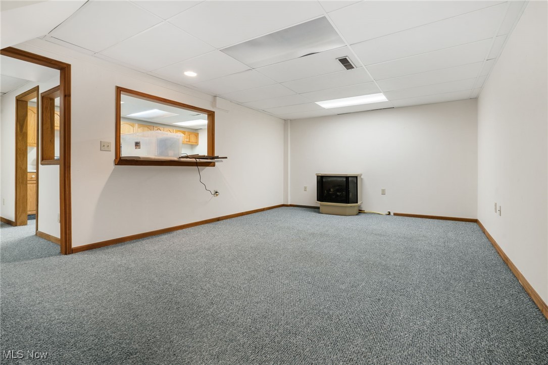 4057 Etter Road Mogadore, OH 44260 - Photo 37 of 41 Carpeted empty room featuring a paneled ceiling