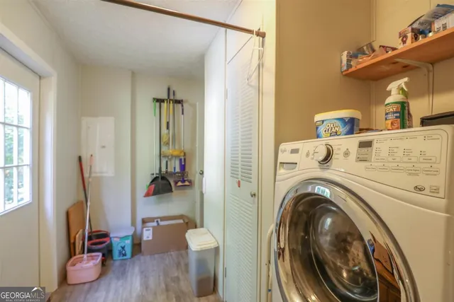 a room with furniture and wooden floor