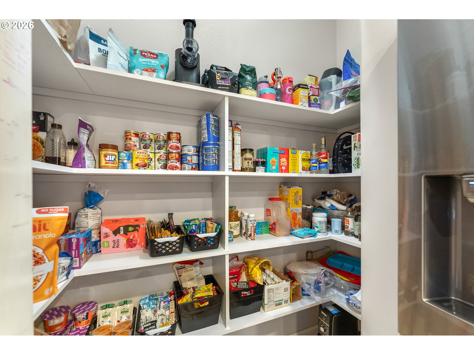 554 Oak Valley Loop Winchester, OR 97495 - Photo 14 of 42 a store room with lots of clutter and toys