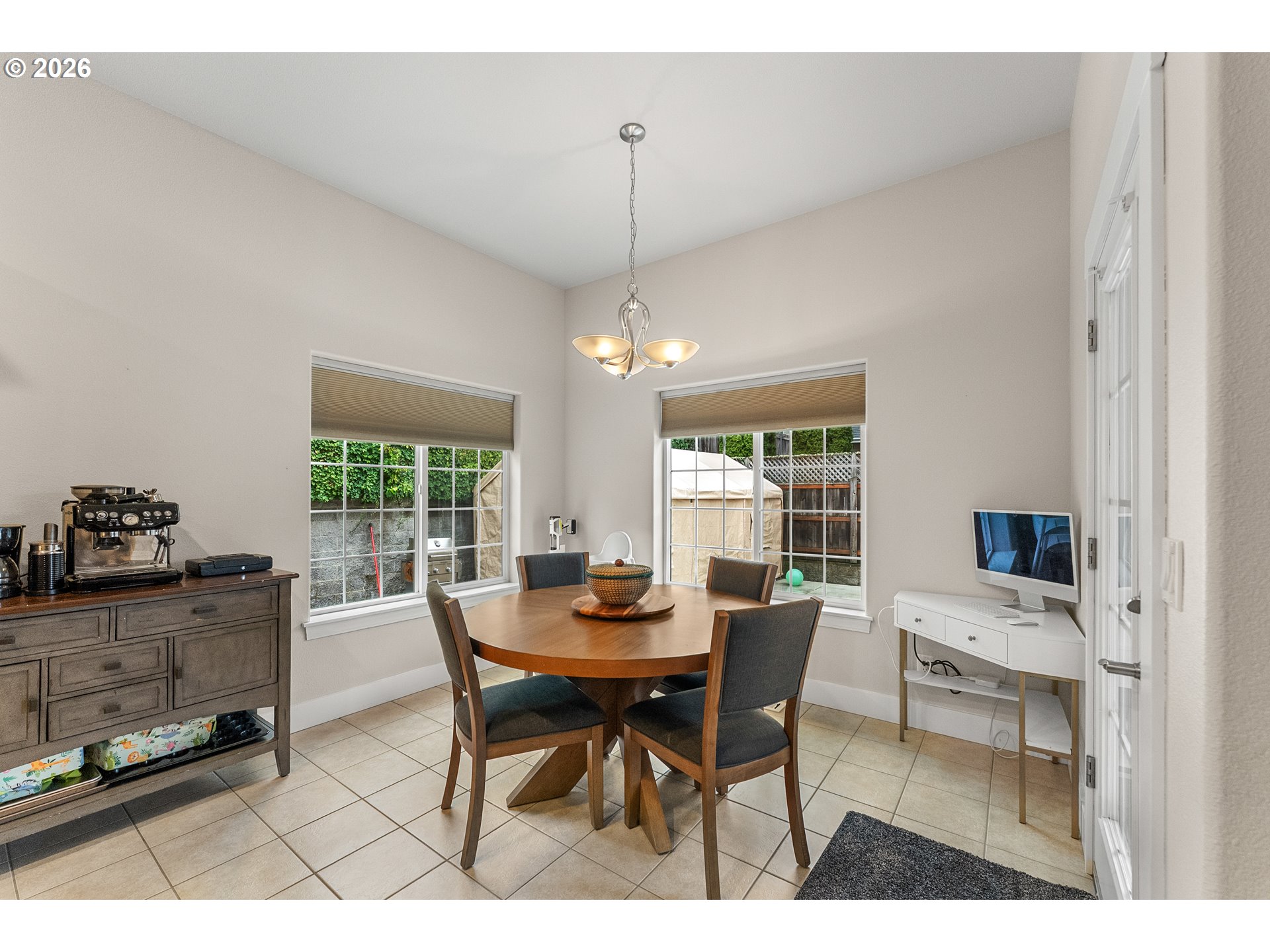 554 Oak Valley Loop Winchester, OR 97495 - Photo 16 of 42 a dining room with furniture a chandelier and window