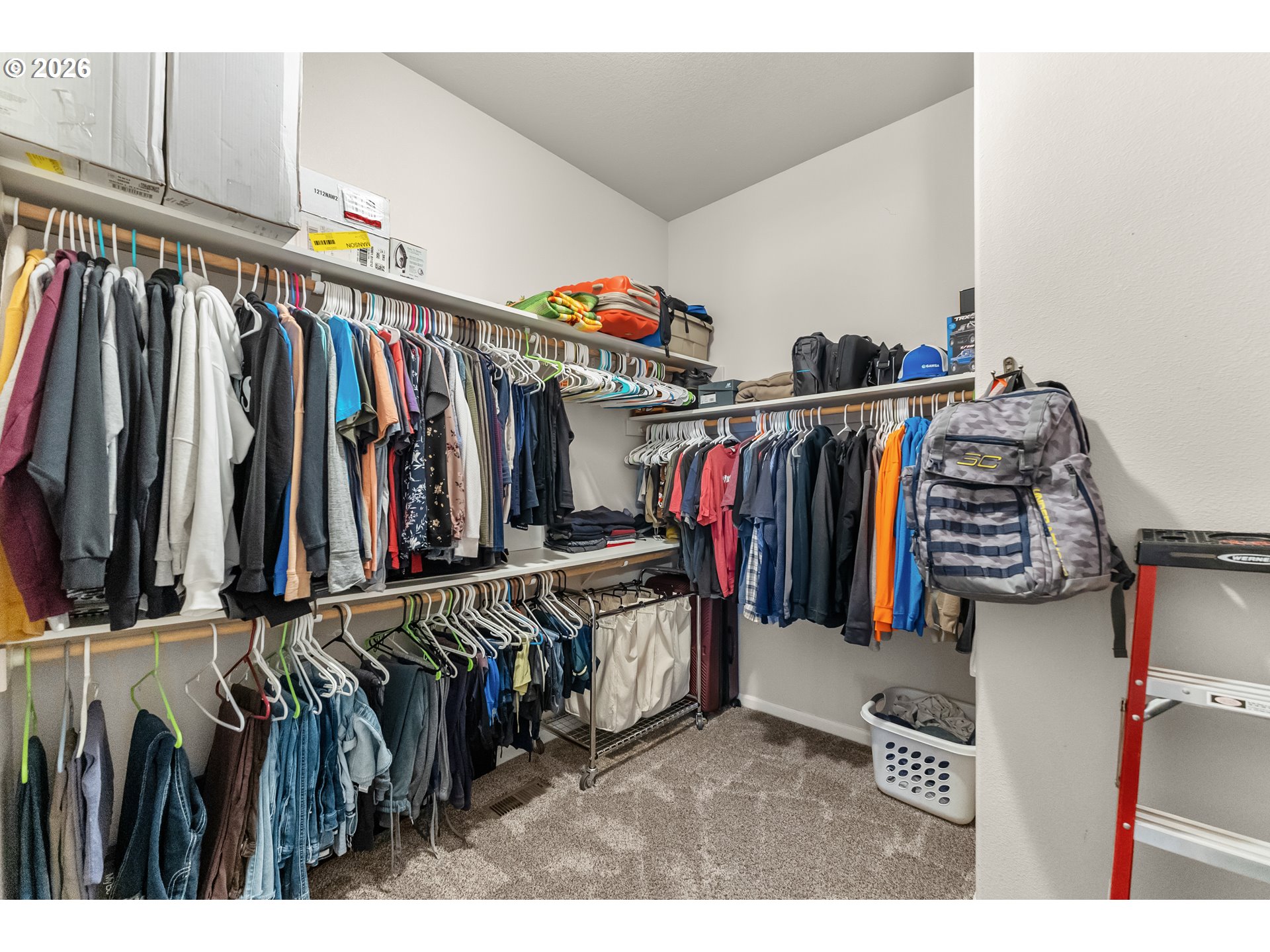 554 Oak Valley Loop Winchester, OR 97495 - Photo 22 of 42 a view of walk in closet with clothes