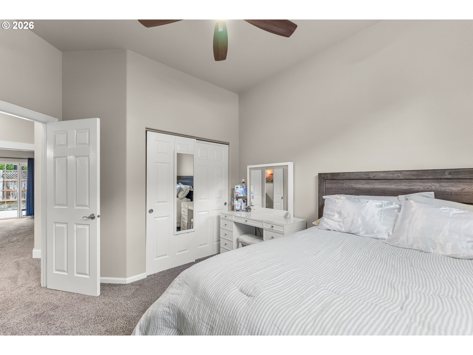 554 Oak Valley Loop Winchester, OR 97495 - Photo 24 of 42 a bedroom with a large bed and dresser