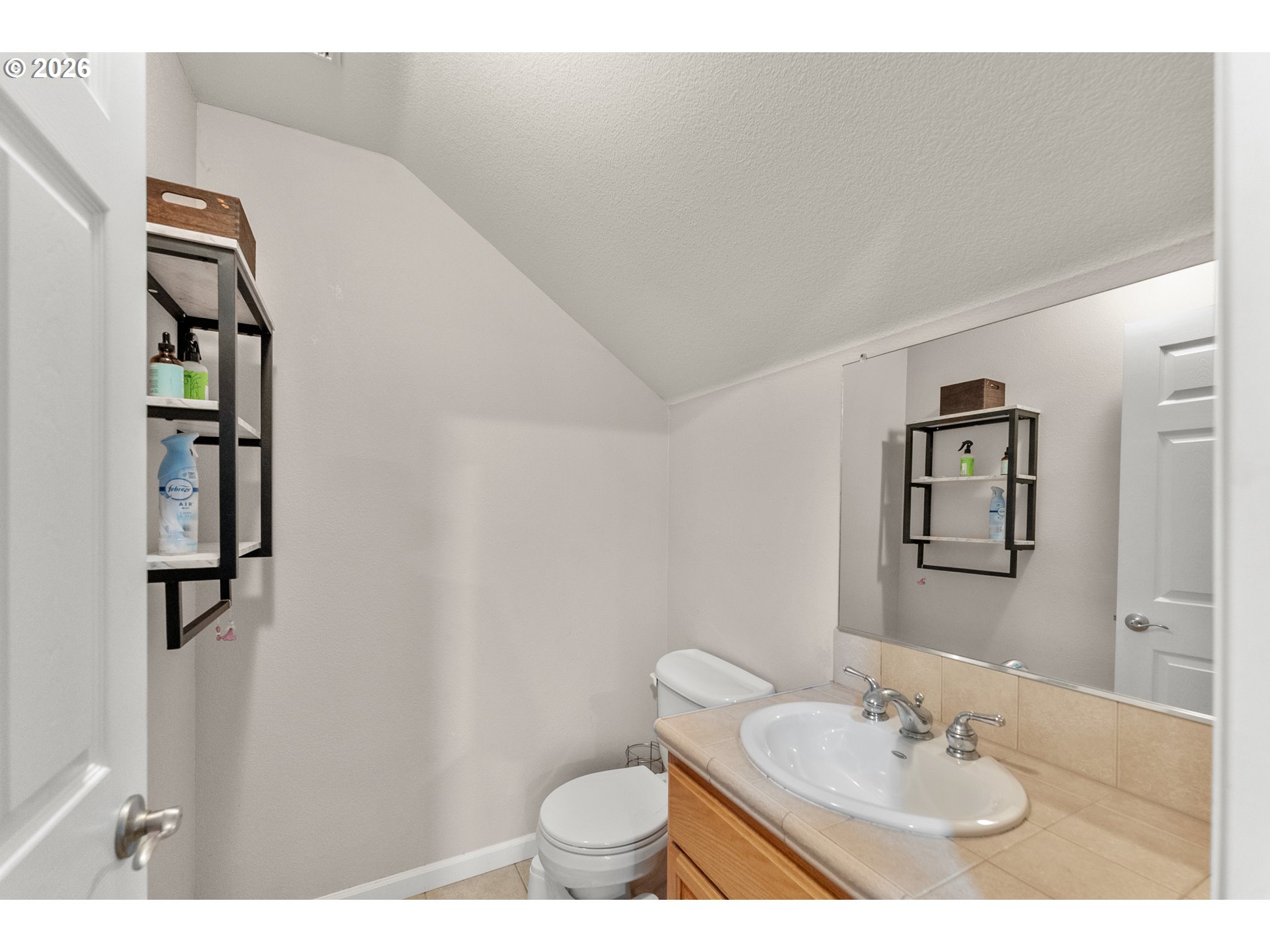 554 Oak Valley Loop Winchester, OR 97495 - Photo 32 of 42 a bathroom with a sink and a mirror