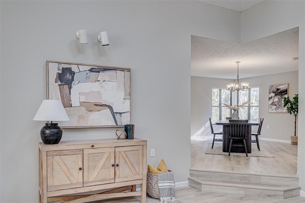 900 Highway 630 East Frostproof, FL 33843 - Photo 11 of 56 a view of dining table chairs and entryway