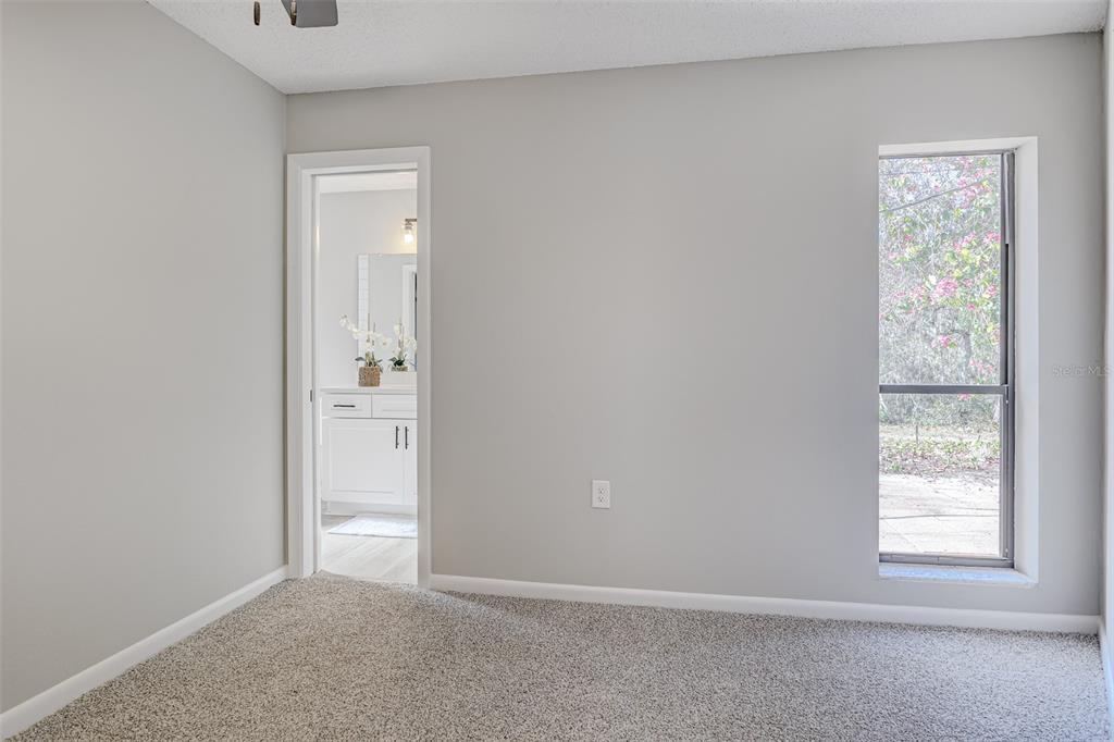 900 Highway 630 East Frostproof, FL 33843 - Photo 33 of 56 an empty room with windows and closet