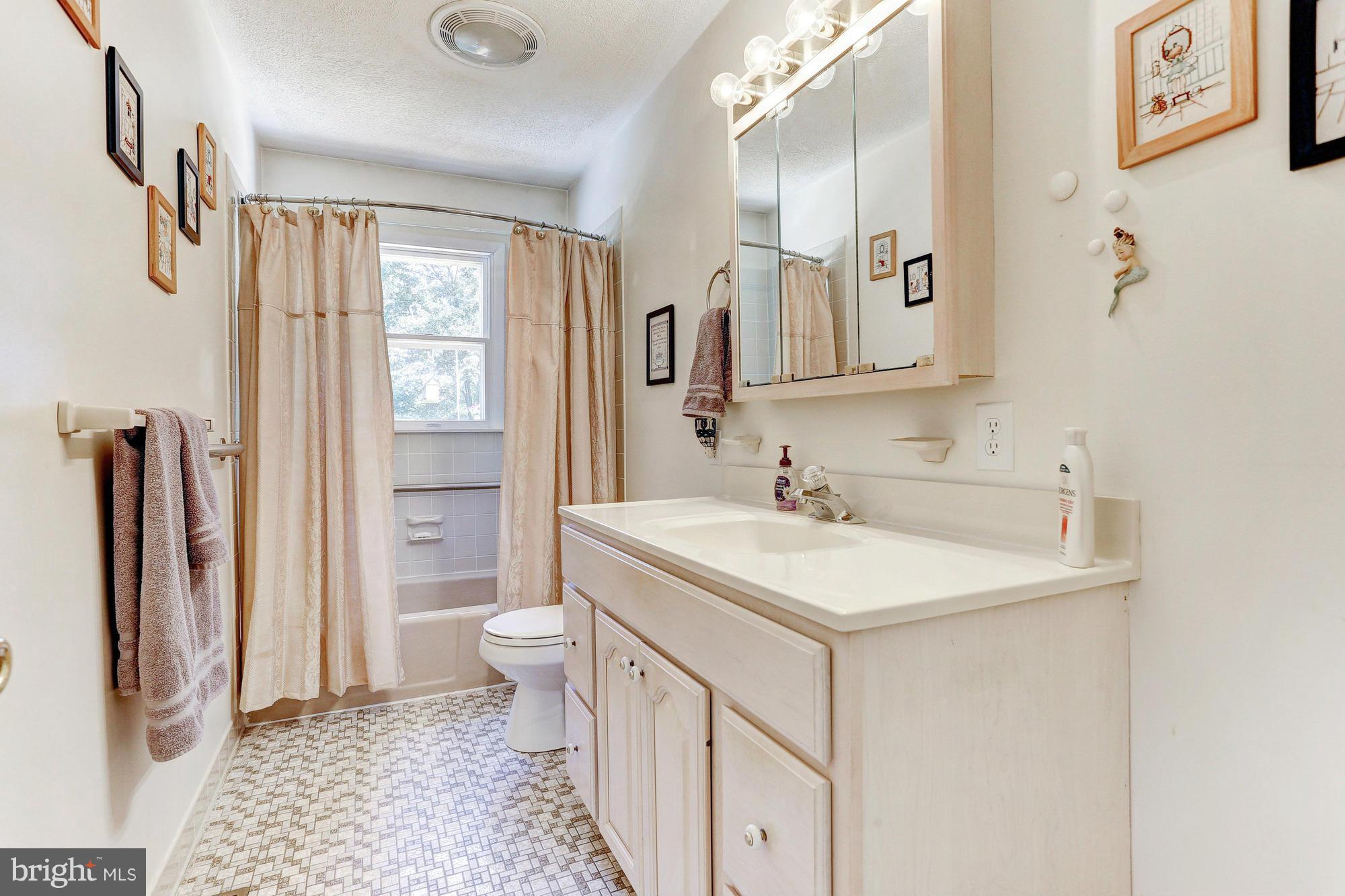 4149 Salem Bottom Road Westminster, MD 21157 - Photo 11 of 25 a bathroom with a sink toilet and shower
