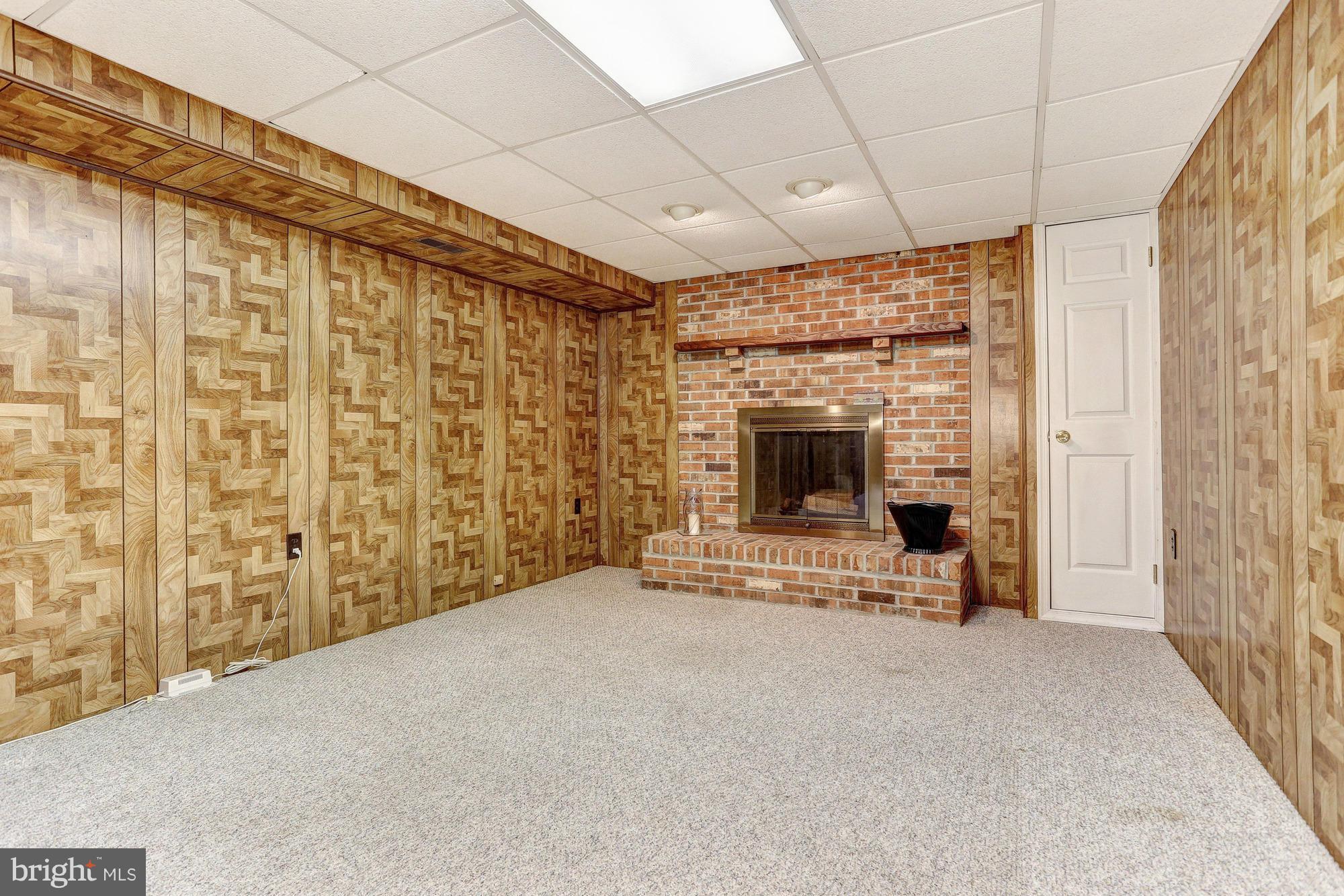 4149 Salem Bottom Road Westminster, MD 21157 - Photo 12 of 25 a view of an empty room with a fireplace