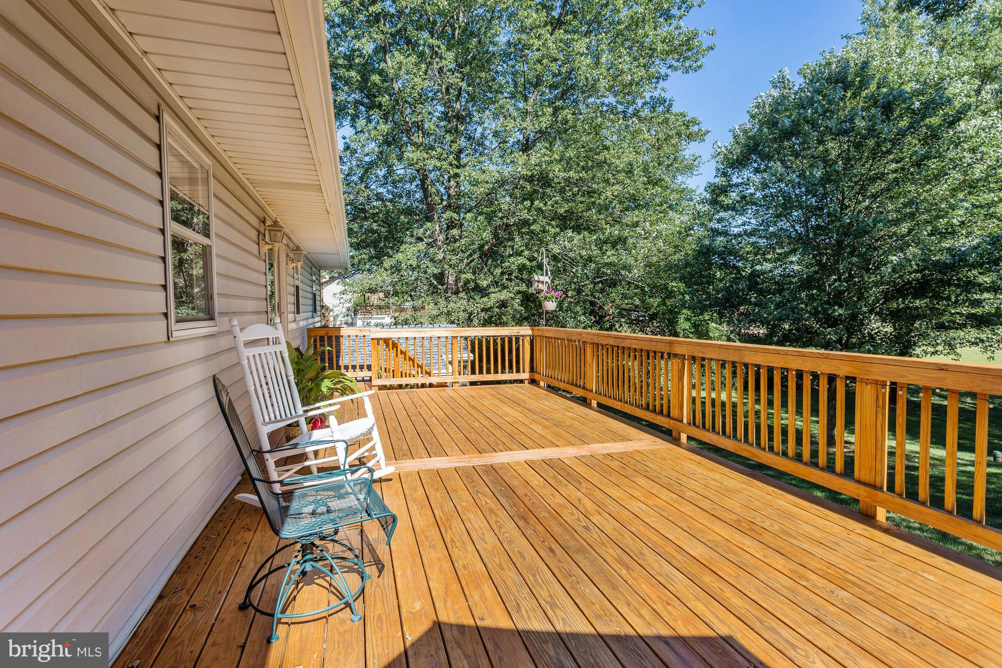 4149 Salem Bottom Road Westminster, MD 21157 - Photo 18 of 25 a view of balcony with wooden floor and outdoor seating