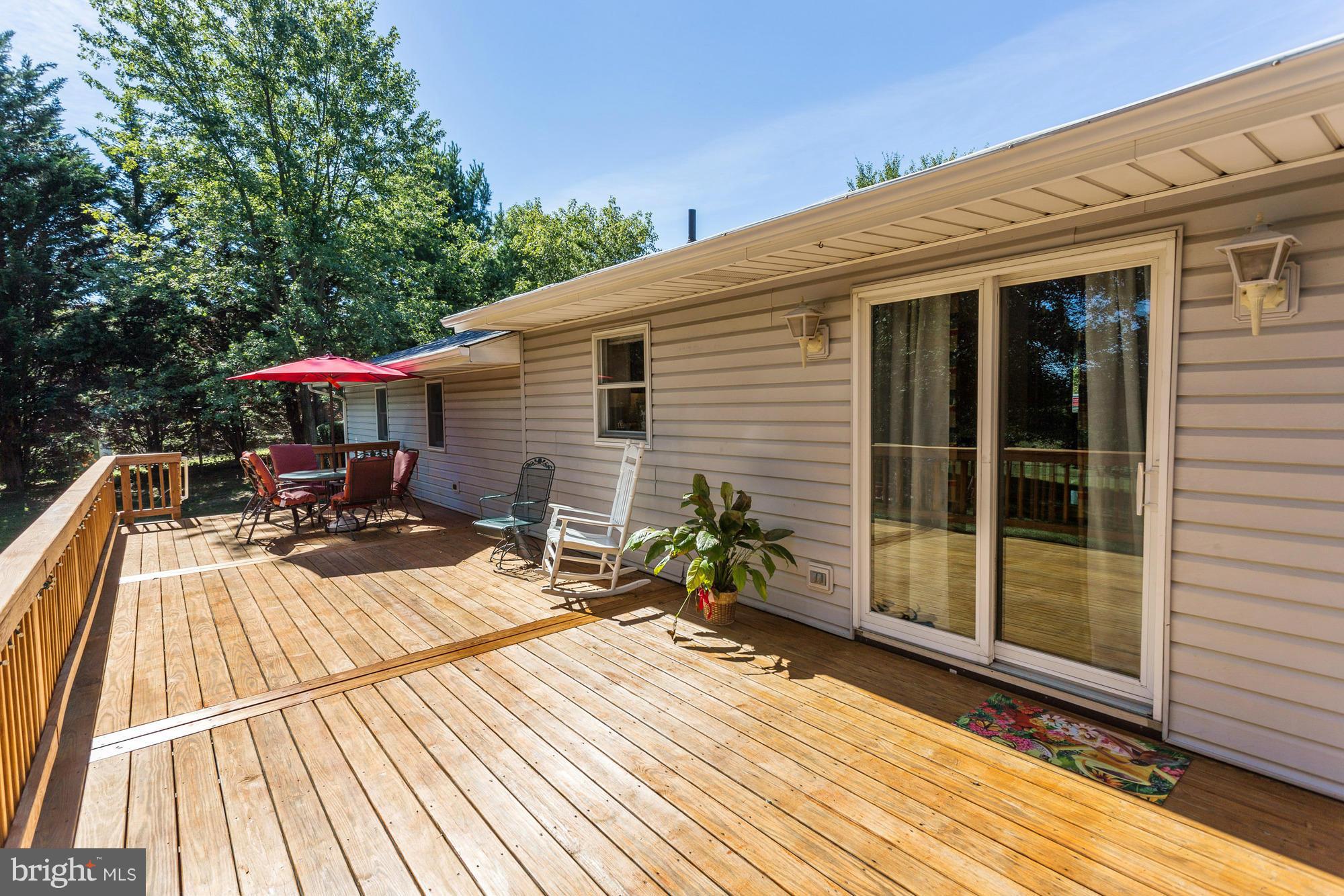 4149 Salem Bottom Road Westminster, MD 21157 - Photo 19 of 25 a view of backyard with a patio and wooden floor