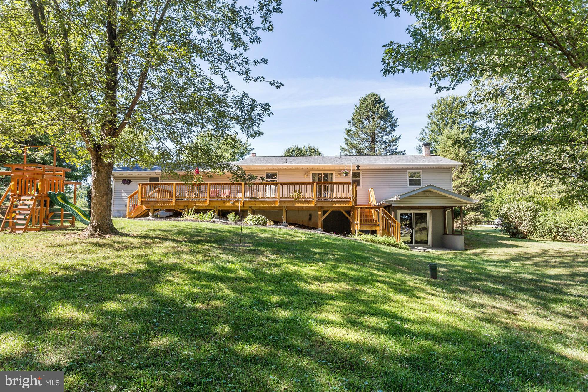 4149 Salem Bottom Road Westminster, MD 21157 - Photo 24 of 25 a front view of a house with a garden