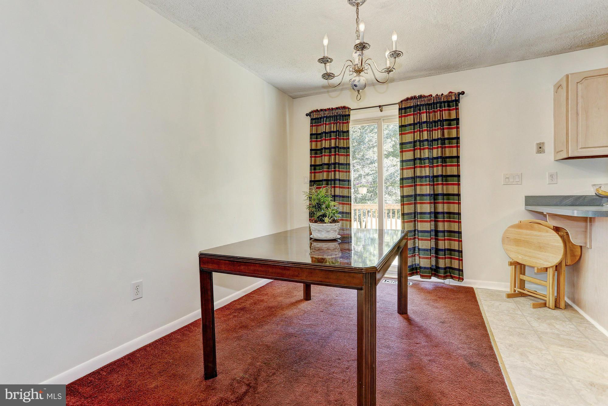 4149 Salem Bottom Road Westminster, MD 21157 - Photo 4 of 25 a view of a room with furniture and wooden floor
