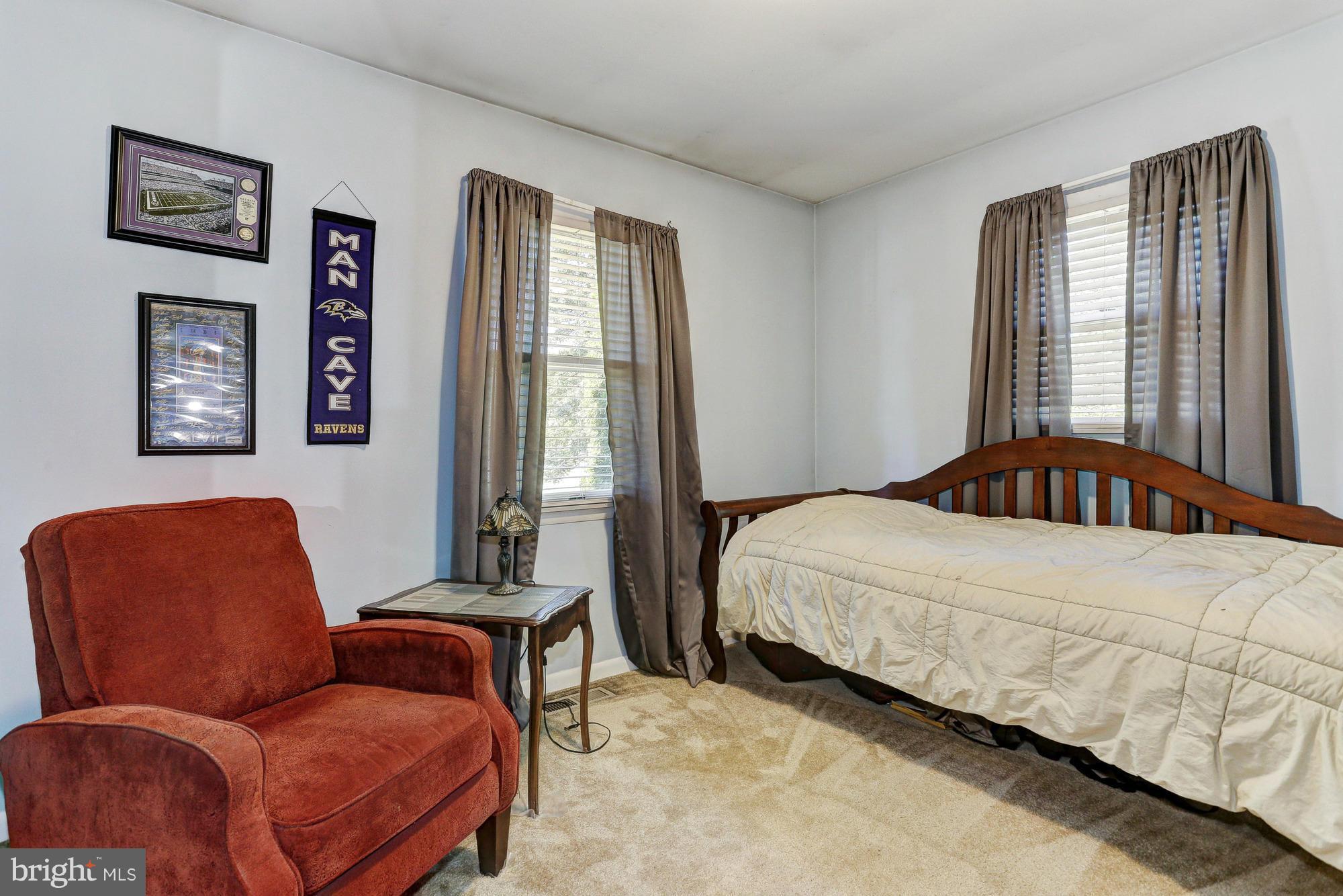 4149 Salem Bottom Road Westminster, MD 21157 - Photo 9 of 25 a bedroom with a bed couch and window