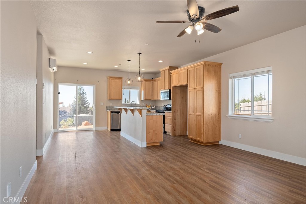 1398 Elliott Road Paradise, CA 95969 - Photo 7 of 34 Living room, Dining room and Kitchen, looking towards the back yard