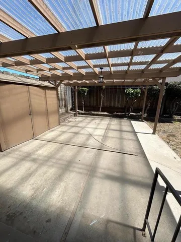 a view of a backyard of a house