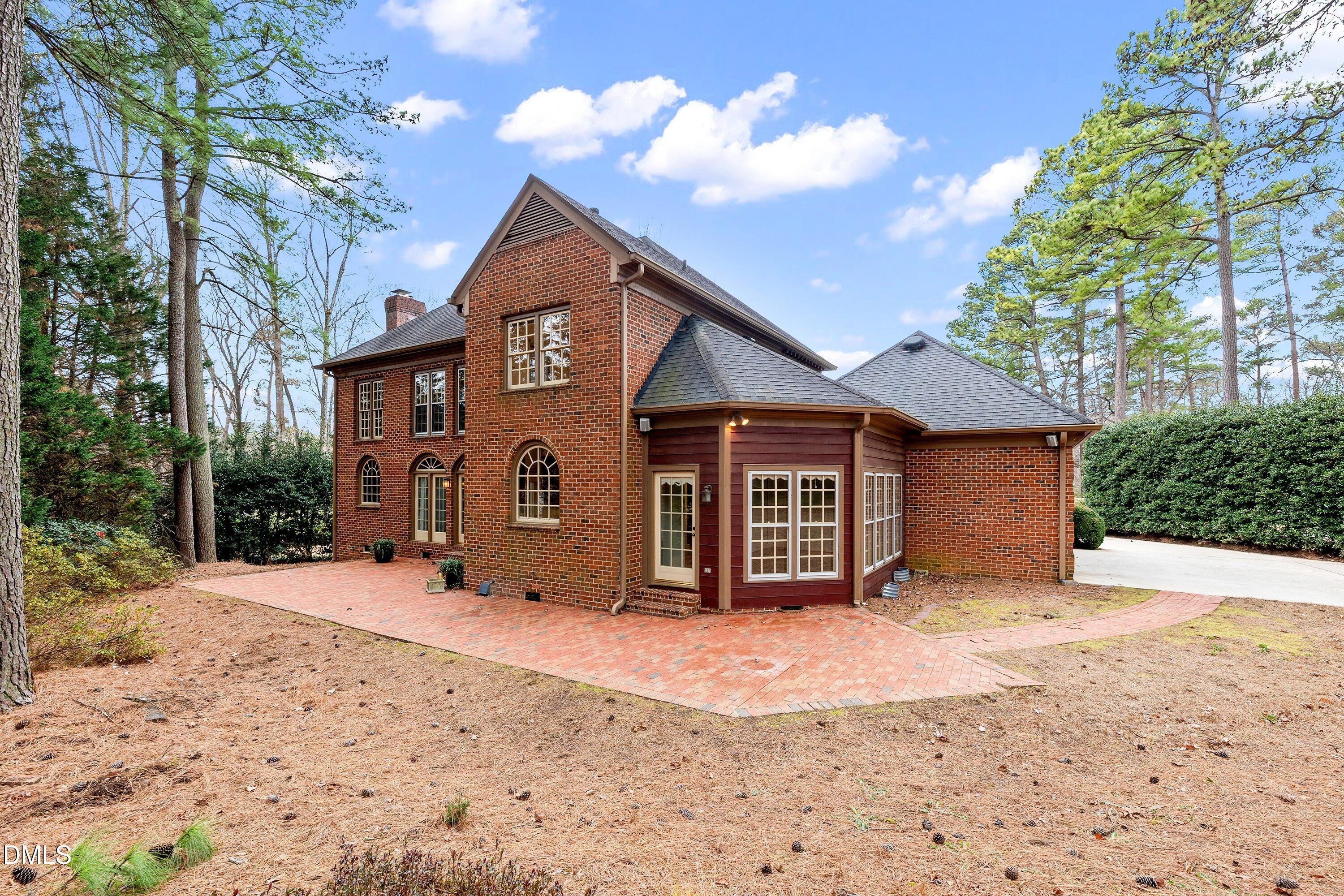 1708 Sawgrass Court Raleigh, NC 27615 - Photo 53 of 60 a view of a house with a yard covered in snow