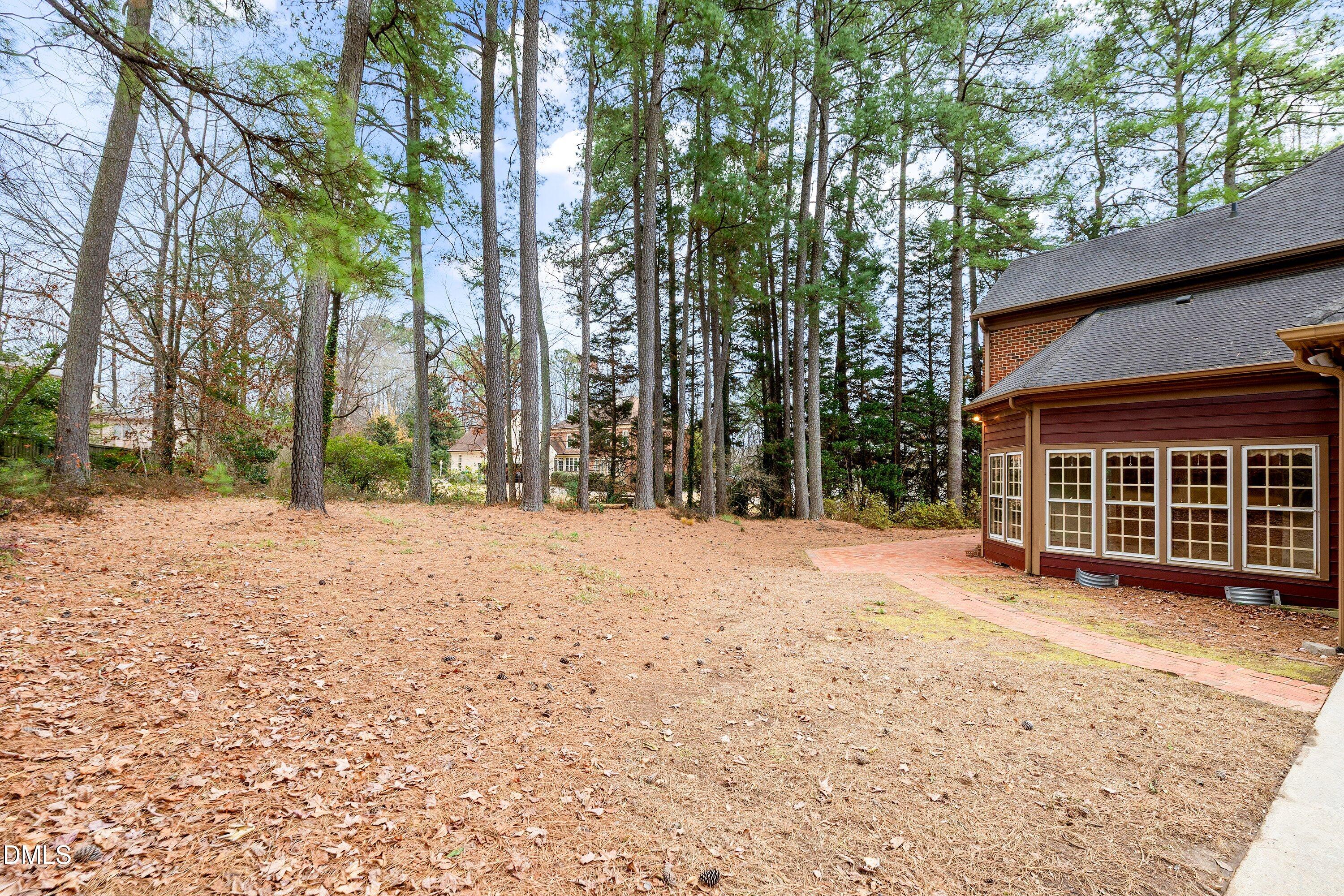 1708 Sawgrass Court Raleigh, NC 27615 - Photo 55 of 60 a view of a house with a yard