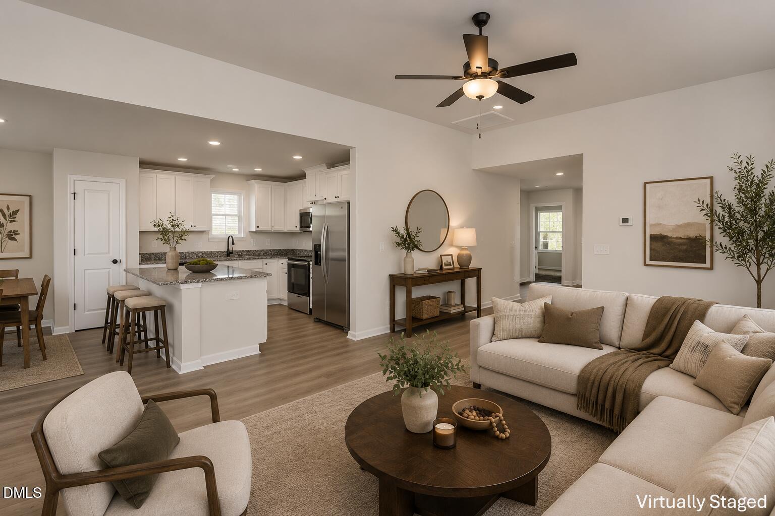 64 Rider Street Broadway, NC 27505 - Photo 5 of 11 a living room with furniture kitchen view and a chandelier