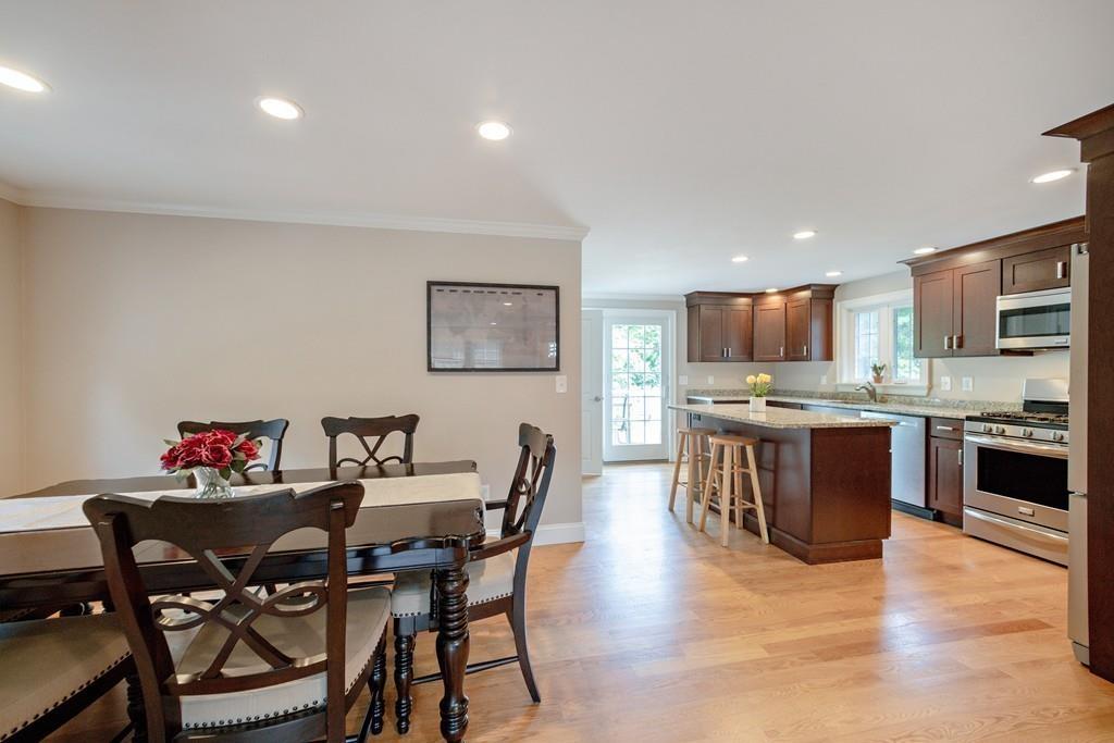 7 Peter Road North Reading, MA 01864 - Photo 14 of 32 a view of a dining room with furniture and wooden floor