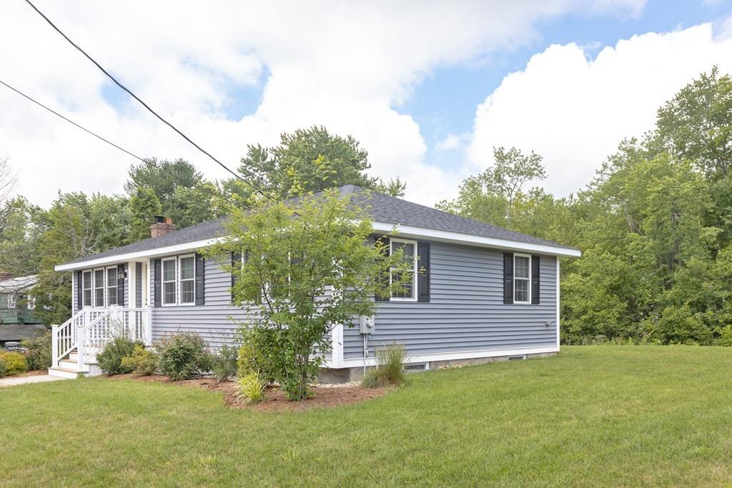 7 Peter Road North Reading, MA 01864 - Photo 2 of 32 a view of a house with a yard