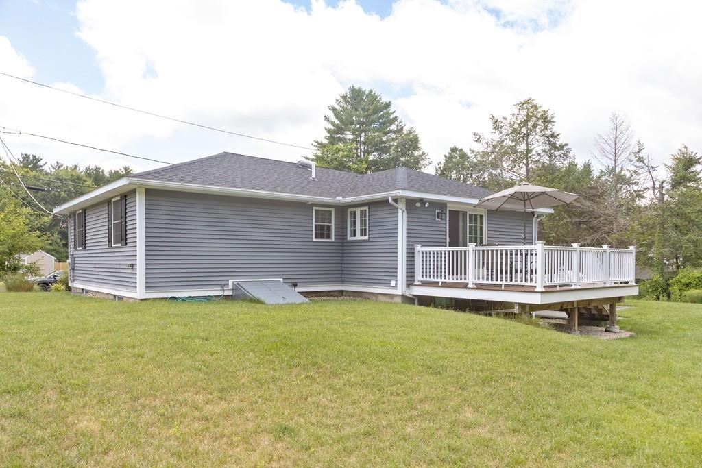 7 Peter Road North Reading, MA 01864 - Photo 4 of 32 a house with swimming pool in front of it
