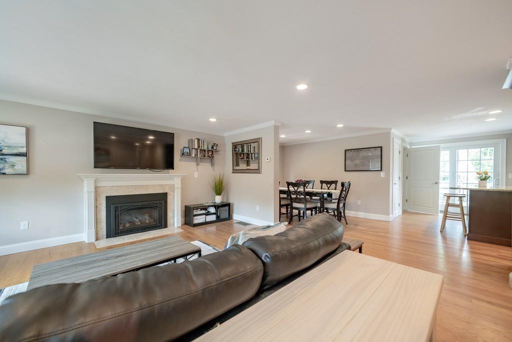7 Peter Road North Reading, MA 01864 - Photo 7 of 32 a living room with furniture or fireplace and a wooden floor