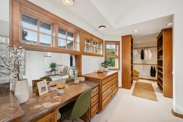 a view of a balcony with chairs