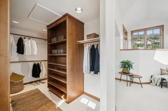 a bathroom with a toilet sink and shower
