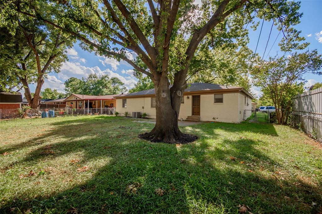 3328 Hedrick Street Fort Worth, TX 76111 - Photo 27 of 28 a view of a house with a yard
