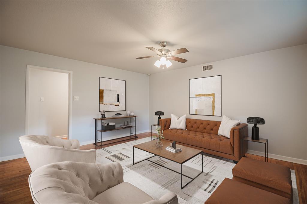 3328 Hedrick Street Fort Worth, TX 76111 - Photo 4 of 28 a living room with furniture and a wooden floor