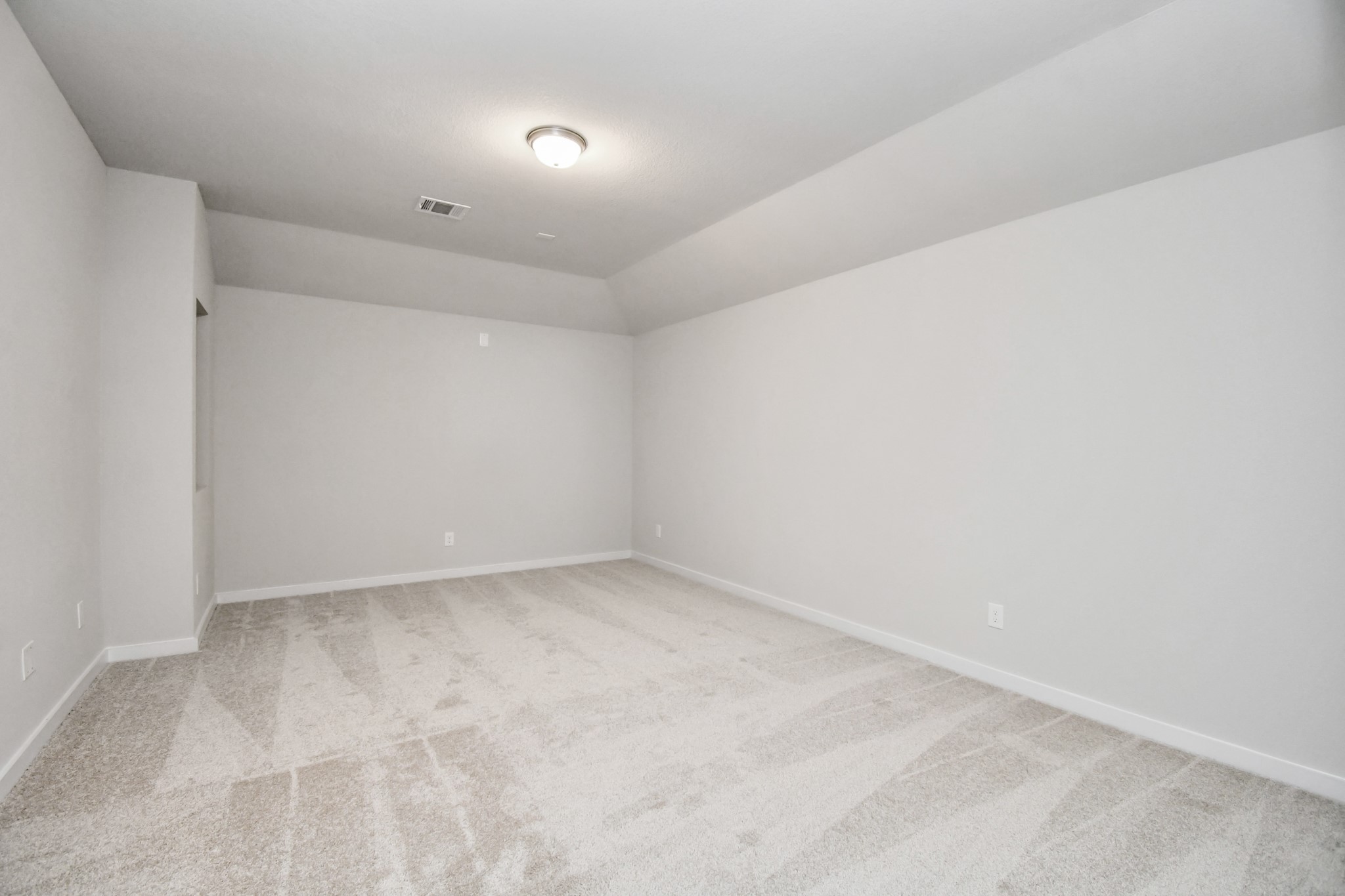 3038 Native Spg Drive Spring, TX 77373 - Photo 32 of 40 Secondary bedroom features plush carpeting, large windows that let in plenty of natural light, bright paint, and spacious closets. Sample photo of completed home with similar floor plan. Actual colors and selections may vary.