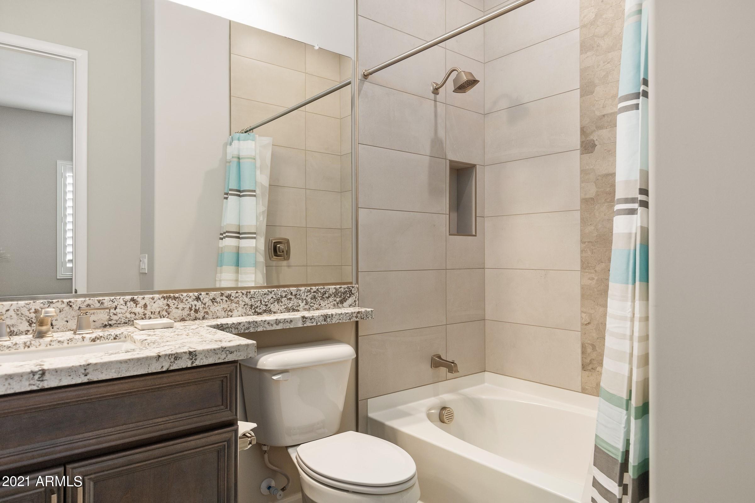 17307 East Woolsey Way Rio Verde, AZ 85263 - Photo 40 of 75 040_Tiled Tub Shower Combo