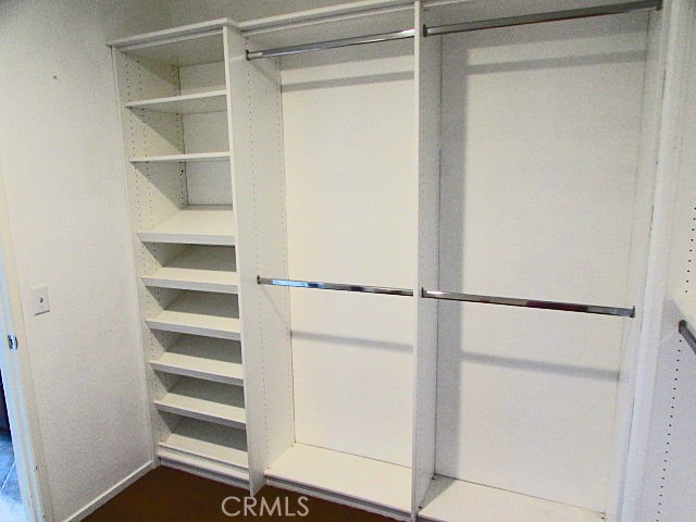 10918 Clover Circle Corona, CA 92883 - Photo 18 of 25 a view of an empty walk in closet