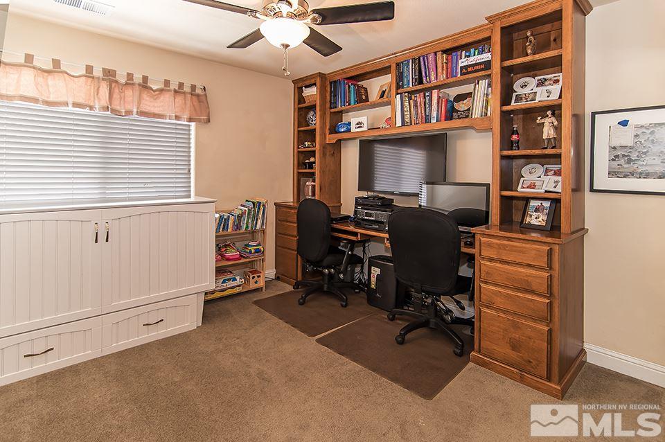 6120 Clover Meadows Court Reno, NV 89519 - Photo 17 of 21 a view of a workspace with furniture and a window