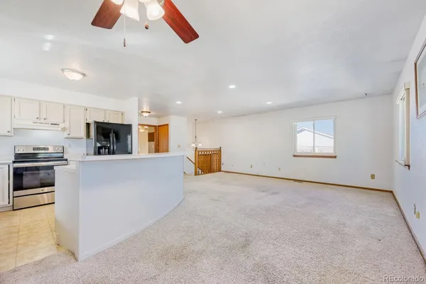 a view of kitchen and microwave