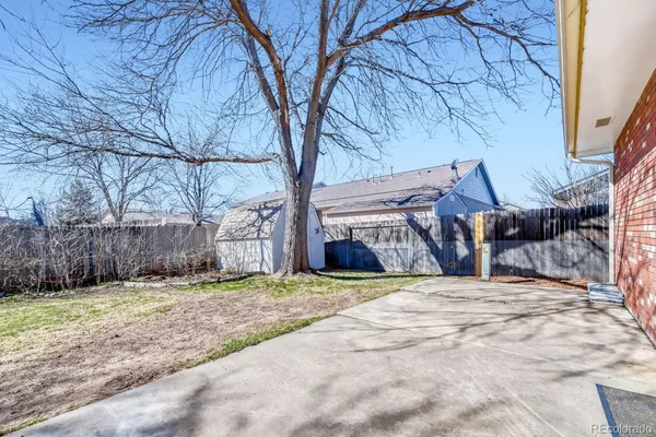 a view of a backyard of a house