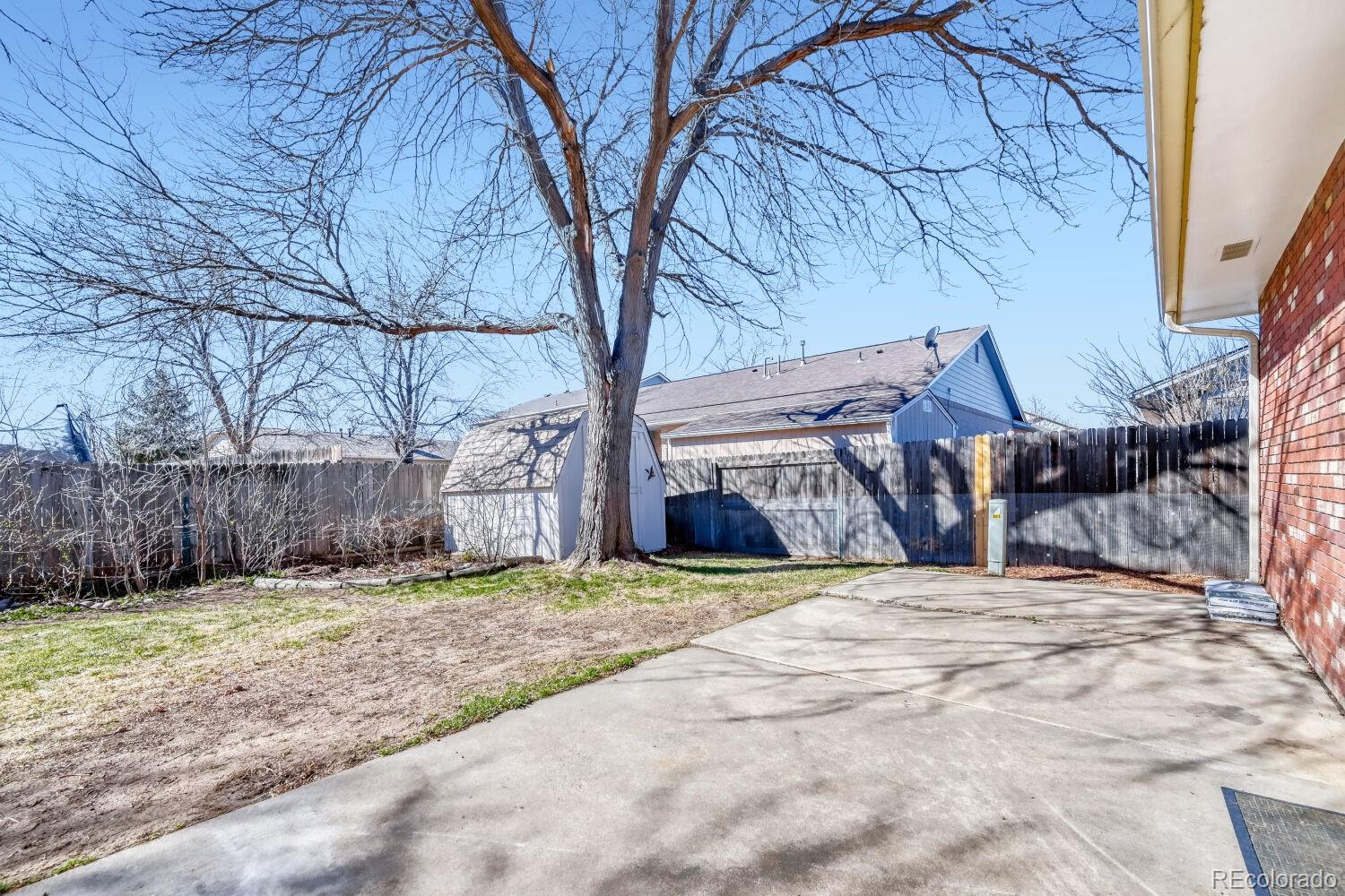 430 Elizabeth Street Fort Lupton, CO 80621 - Photo 22 of 30 a view of a backyard of a house