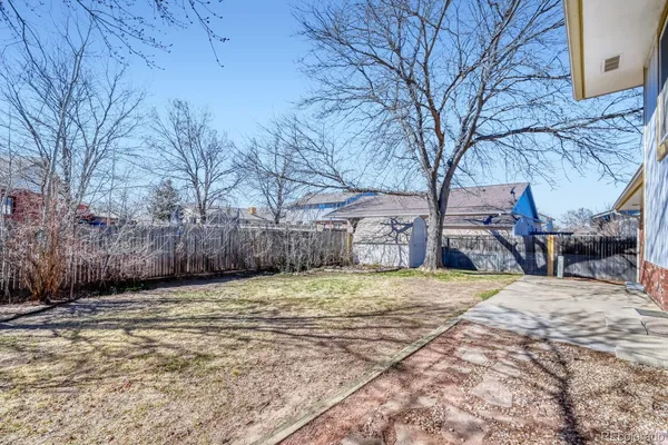 a view of a backyard of a house