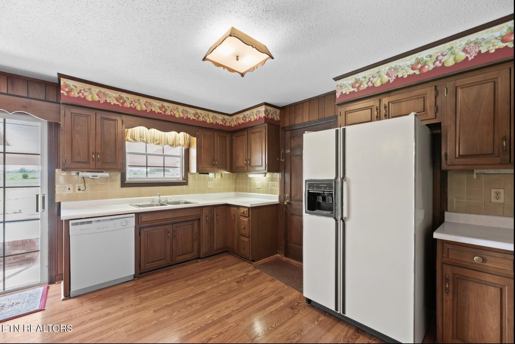 571 Calhoun Drive Greenback, TN 37742 - Photo 17 of 44 a kitchen with stainless steel appliances granite countertop a refrigerator and a sink