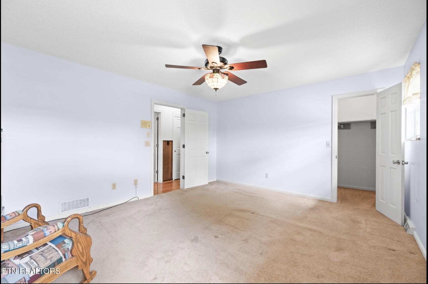 571 Calhoun Drive Greenback, TN 37742 - Photo 26 of 44 a view of a livingroom with a chandelier fan